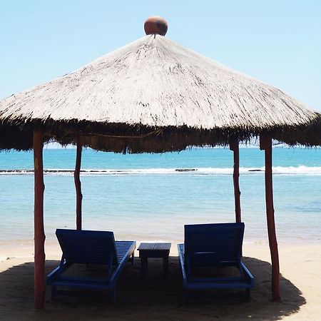 Hotel Robinson Plage Lome Bagian luar foto