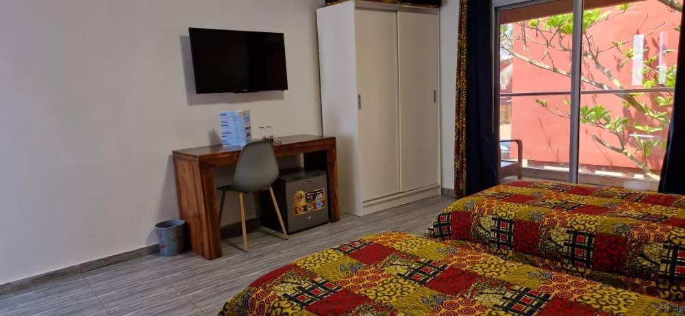 Hotel Robinson Plage Lome Bagian luar foto